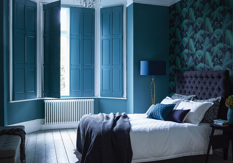 Pastel Blue Shutters in a Bedroom